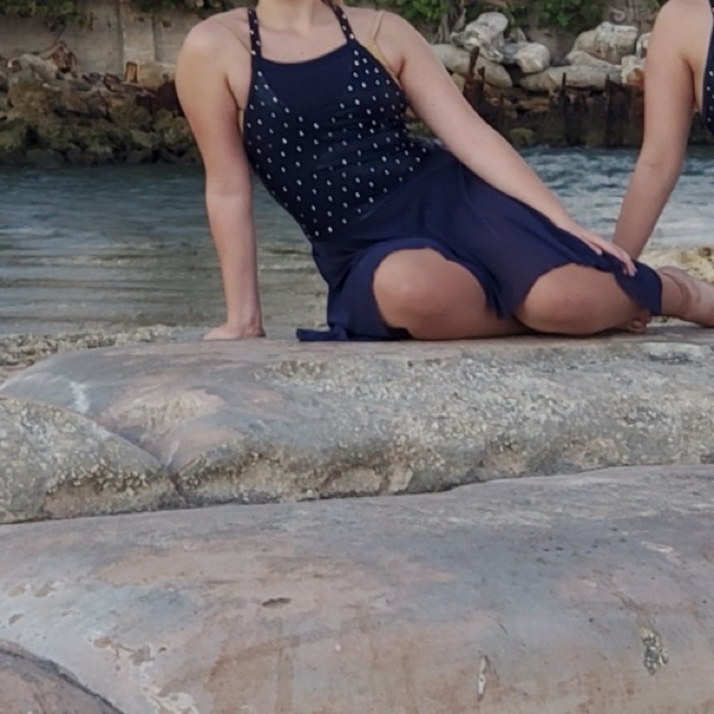 Navy lyrical costume with custom rhinestones.